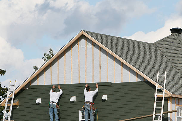 Professional Storm Damage Siding Repair technician working in Bath, PA
